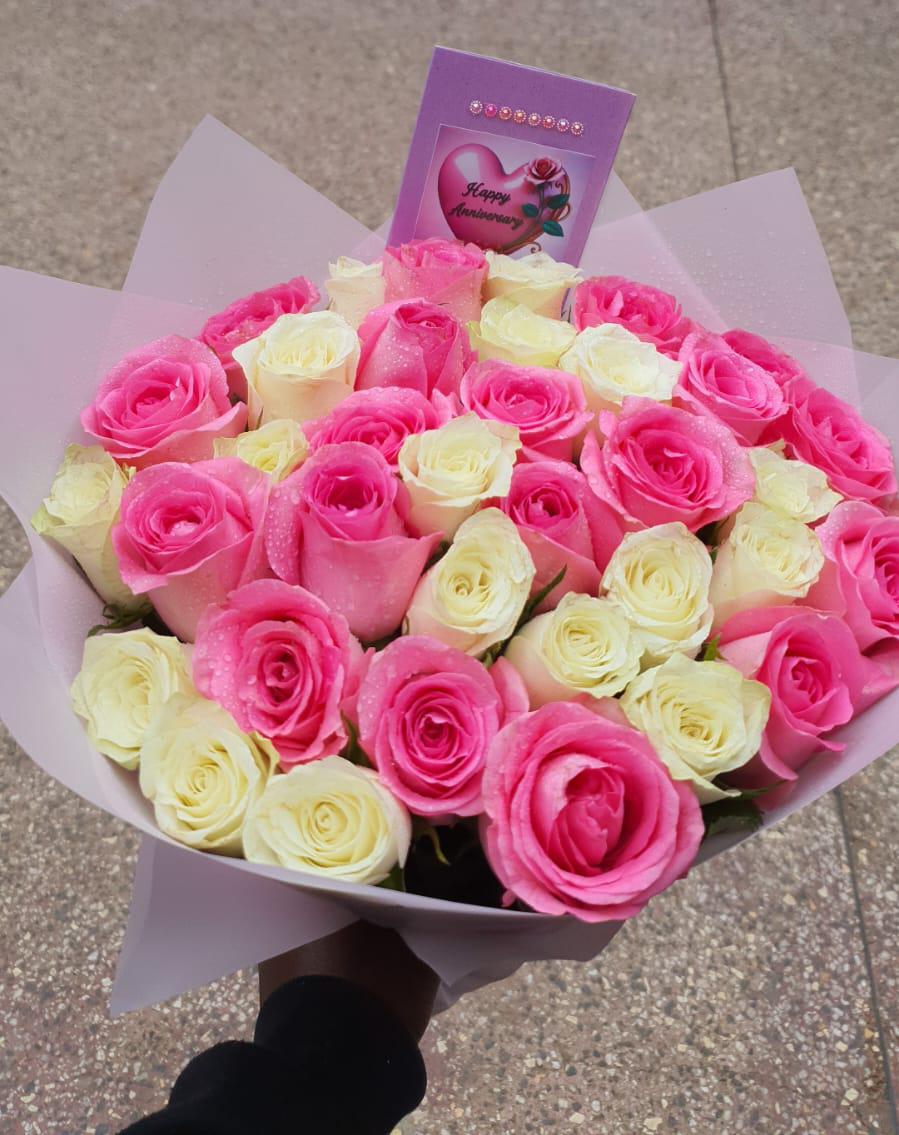 WhatsApp Image 2026-08-19 at 11.07.10 AM Pink and White Rose Arrangement