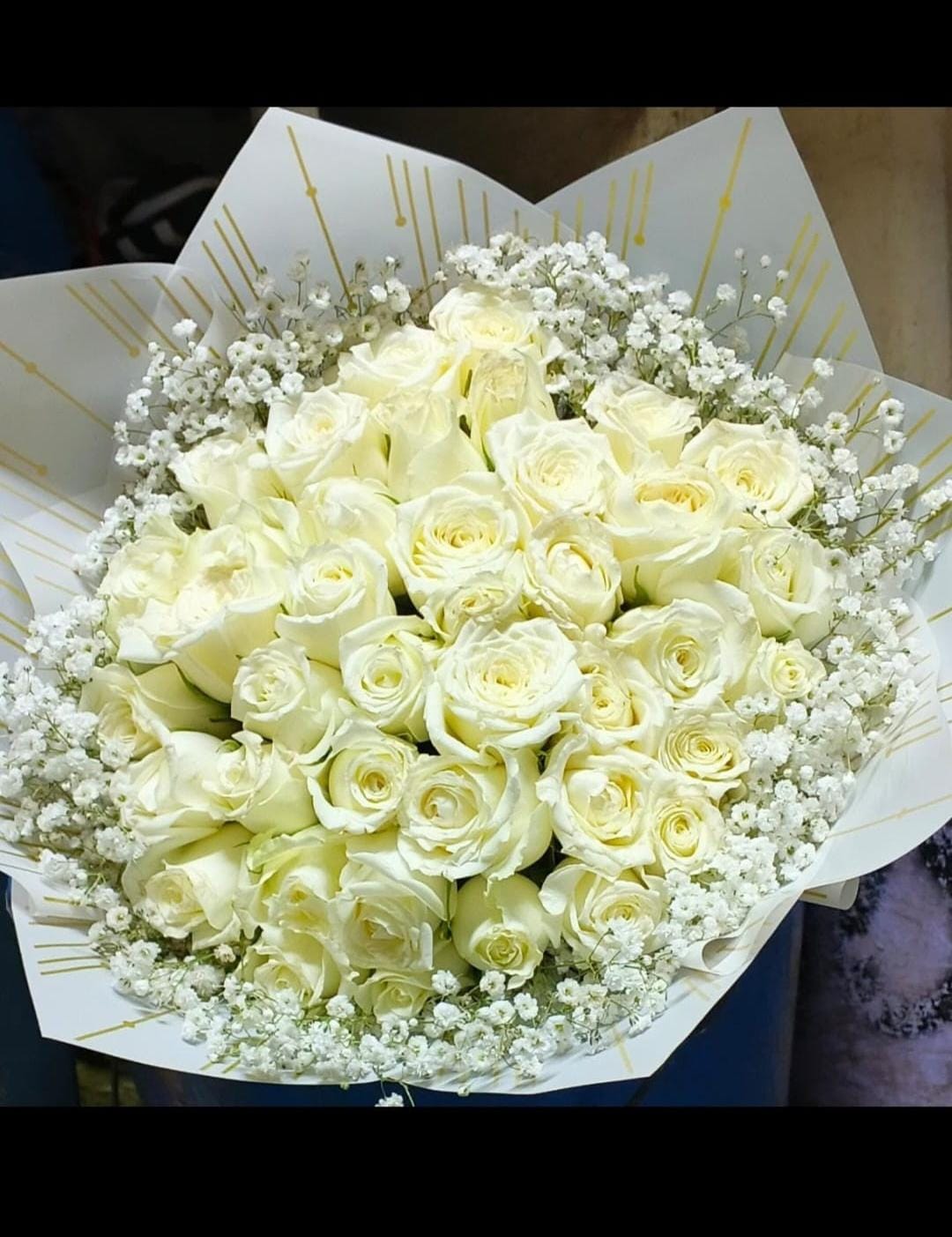 WhatsApp Image 2026-08-19 at 8.35.53 AM Just White Roses and Baby's Breathe